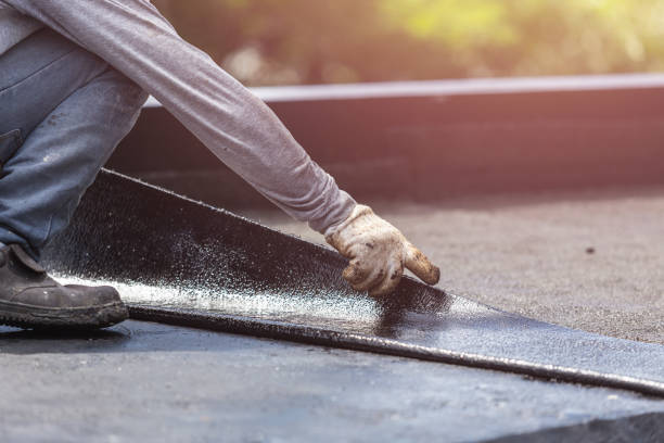 Professional Basement Waterproofing technician working in Halstead, KS